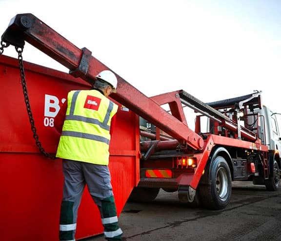 Biffa skip being offloaded from vehicle