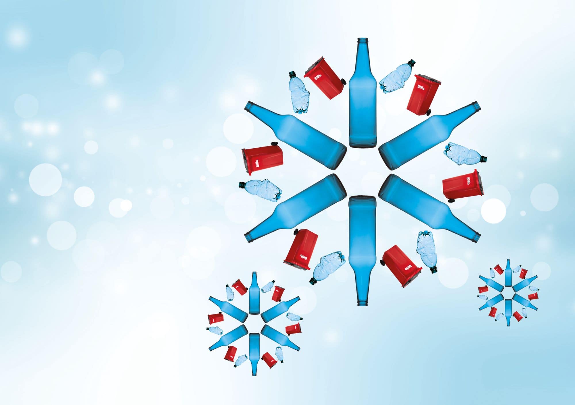 Snowflake made out of blue bottles and bins