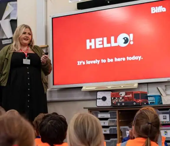 Georgia Gibson talking in front of Wokingham primary school