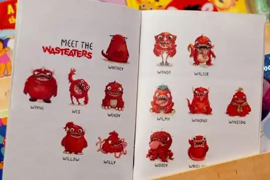 Open wasteater storybook sat on childrens bookshelf, page shown is meet the wasteaters page showing all the wasteaters