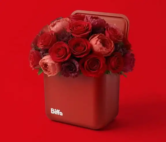 Red food caddy with roses in it