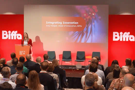 Amy on stage presenting at WNZ