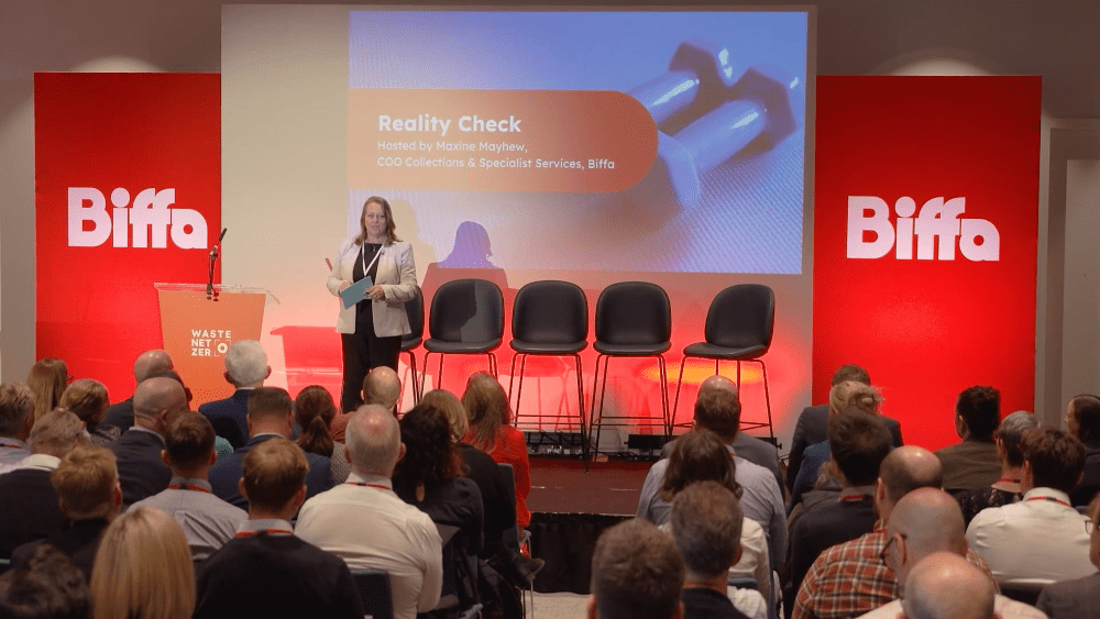 Maxine hosting on stage