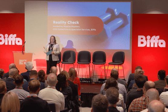 Maxine hosting on stage