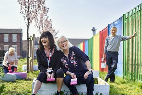 Public laughing in garden