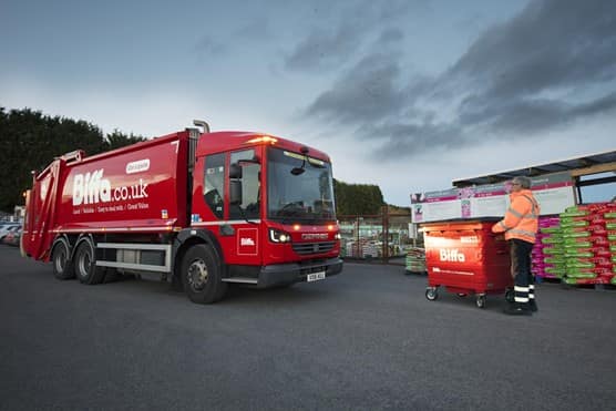 Biffa vehicle and worker outside courtyard
