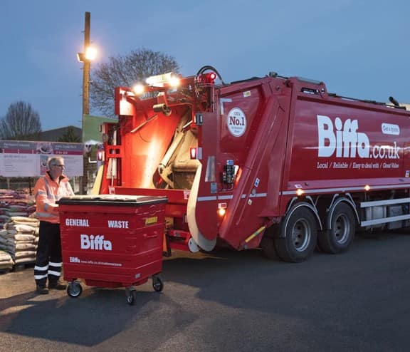 Biffa worker with bin and truck