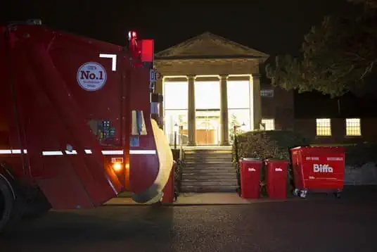 Biffa truck and bins at night