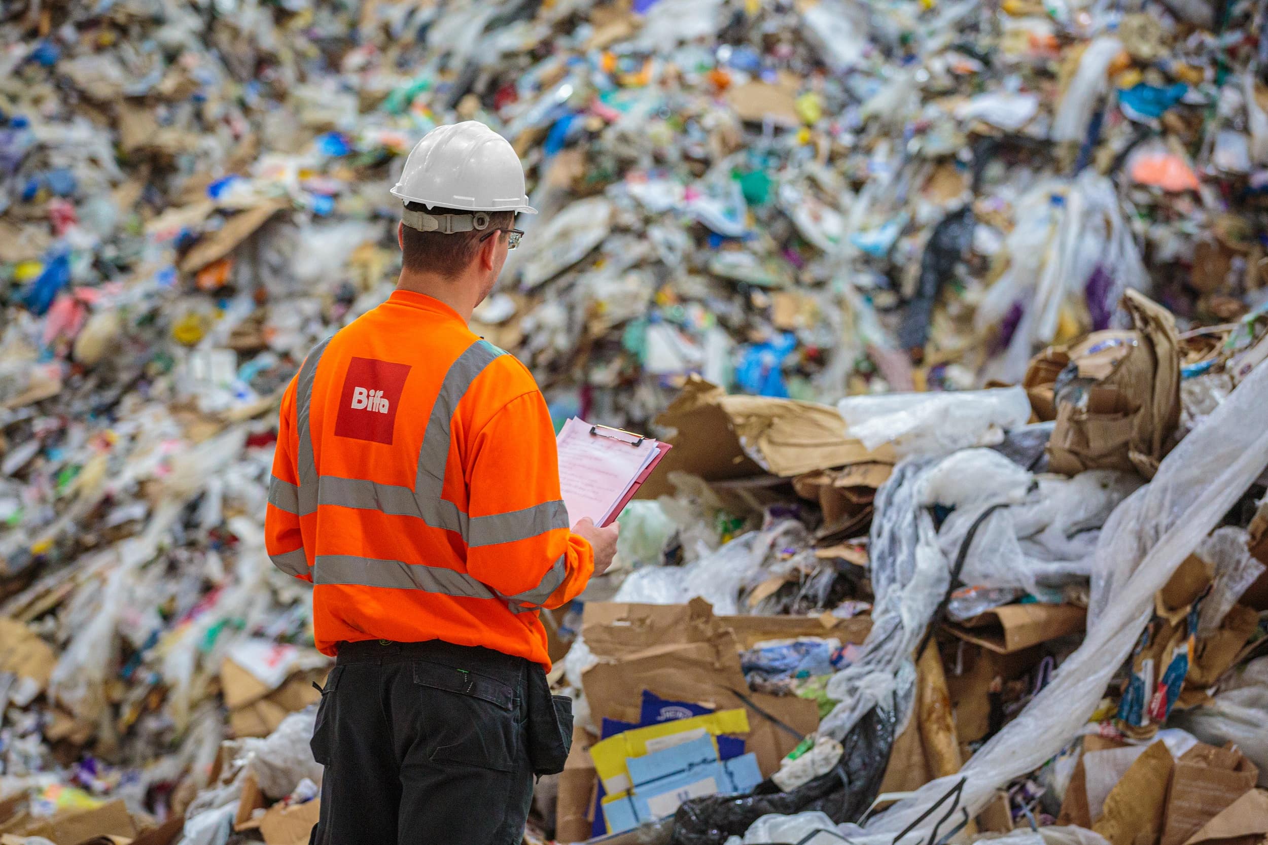 Biffa operative recording waste
