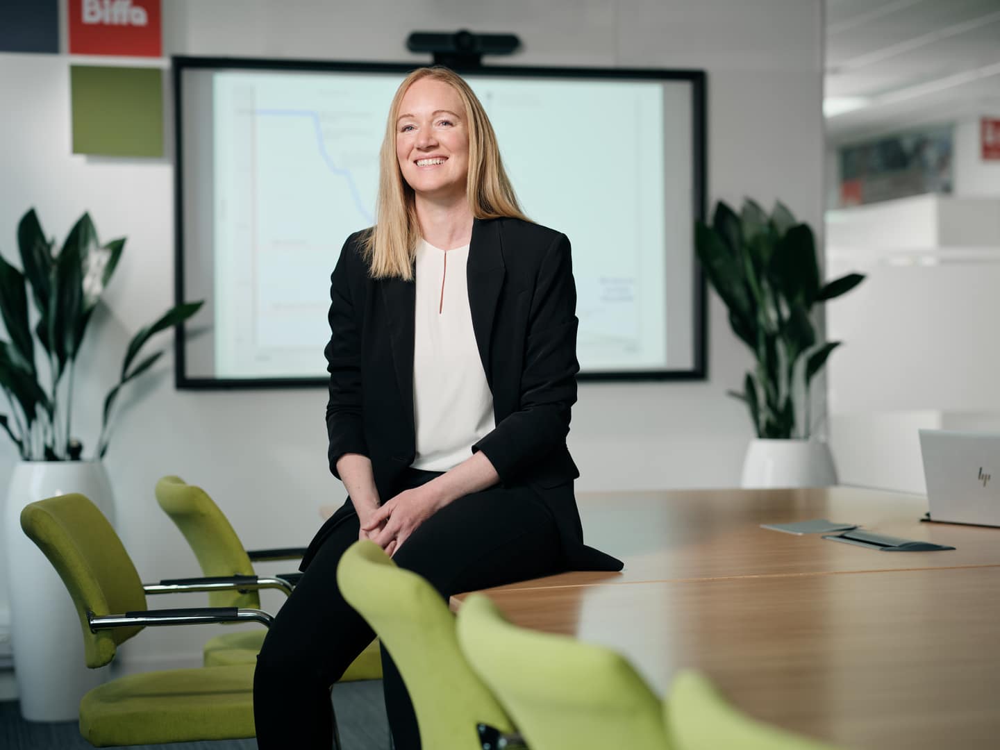 Biffa female employee in board room