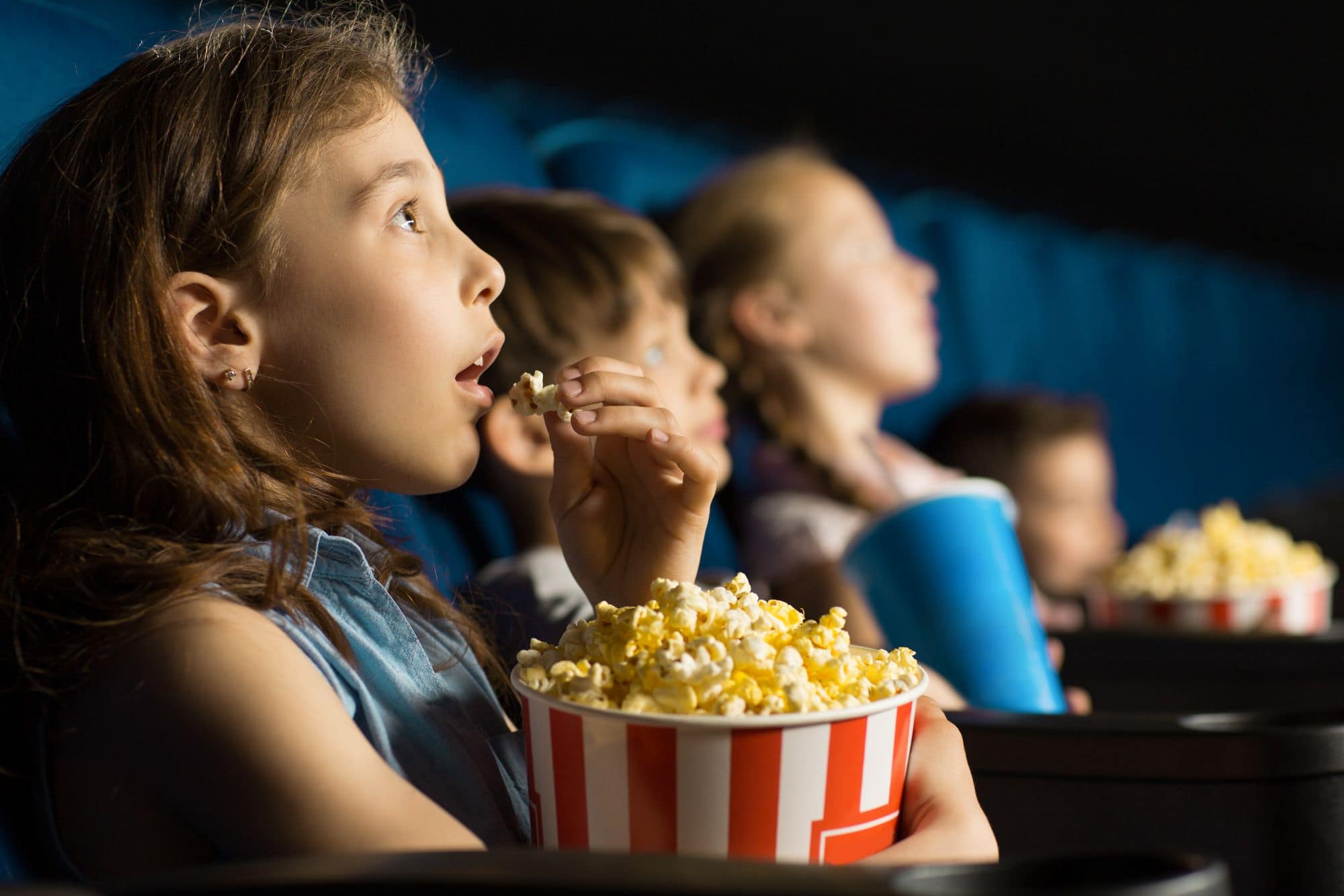 Children sat in a cinema