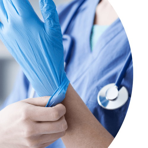 Doctor putting on gloves