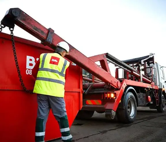Biffa skip being offloaded from vehicle