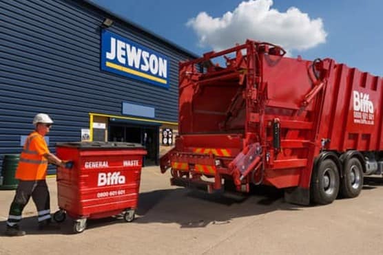Biffa bin and truck outside Jewson branch