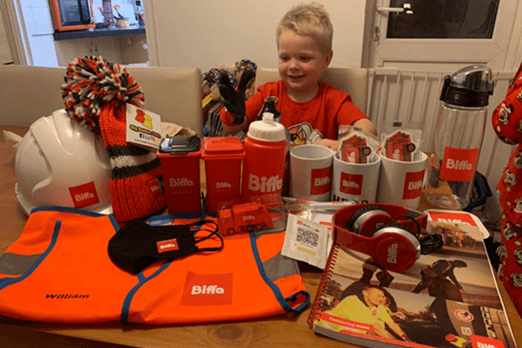Boy surrounded by Biffa gear