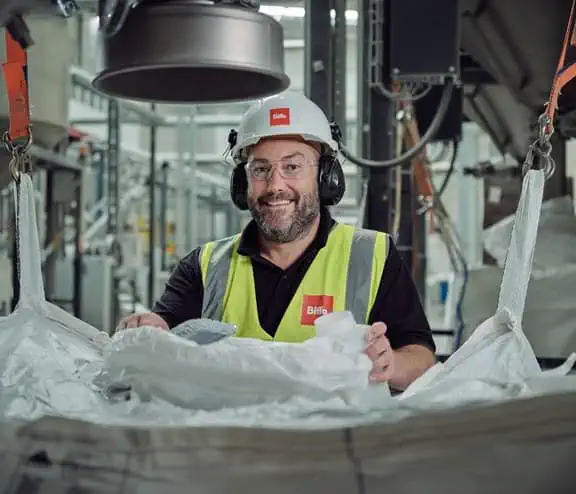 Happy Biffa employee having his picture taken after Biffa named very good place to work in major employee survey