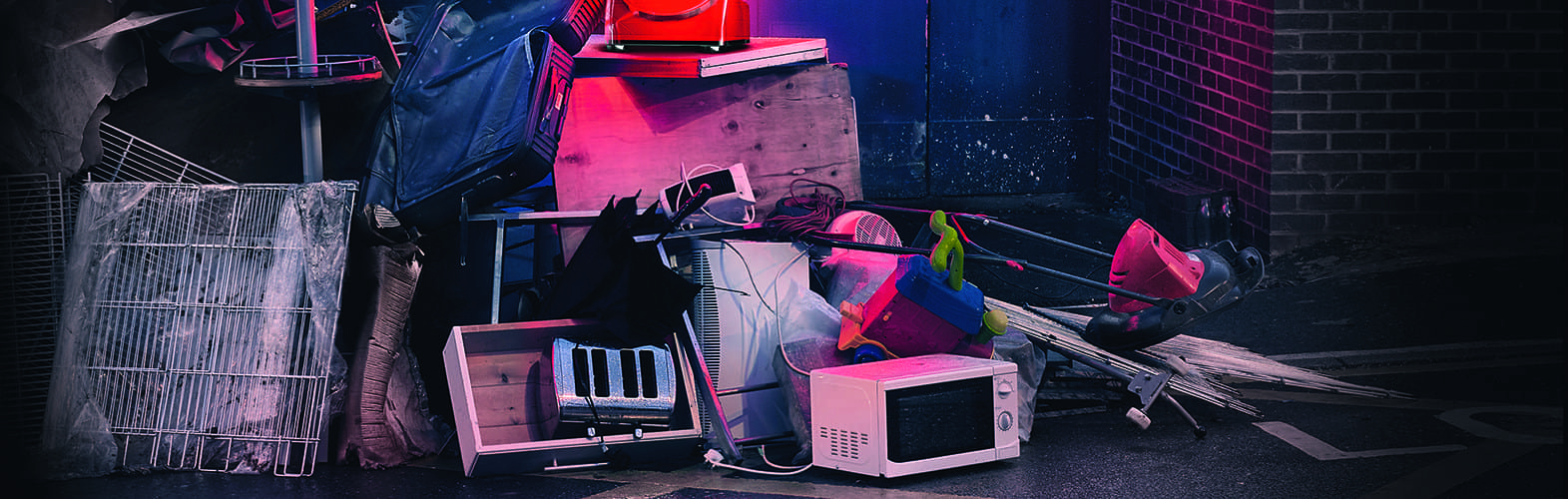 Household items including a microwave, lawnmower and other domestic items