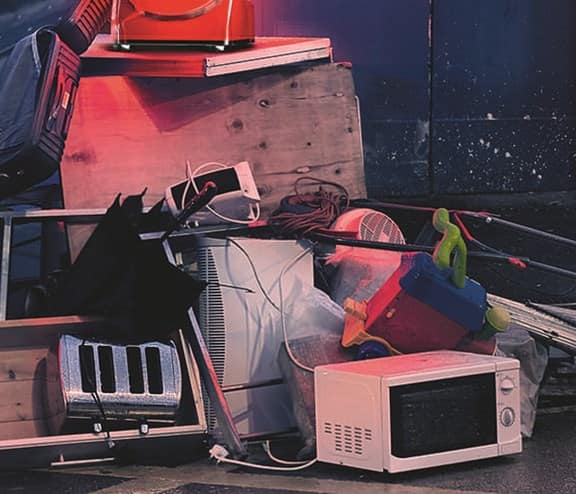 Household items including a microwave, lawnmower and other domestic items