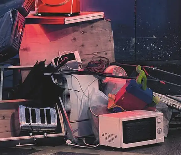 Household items including a microwave, lawnmower and other domestic items