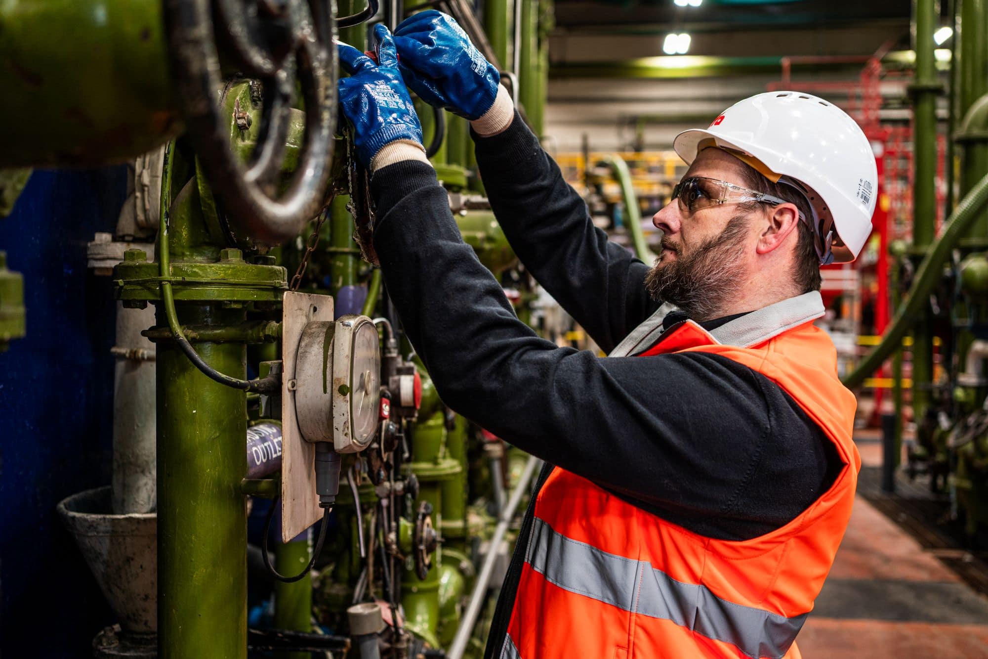 Employee working on machinery