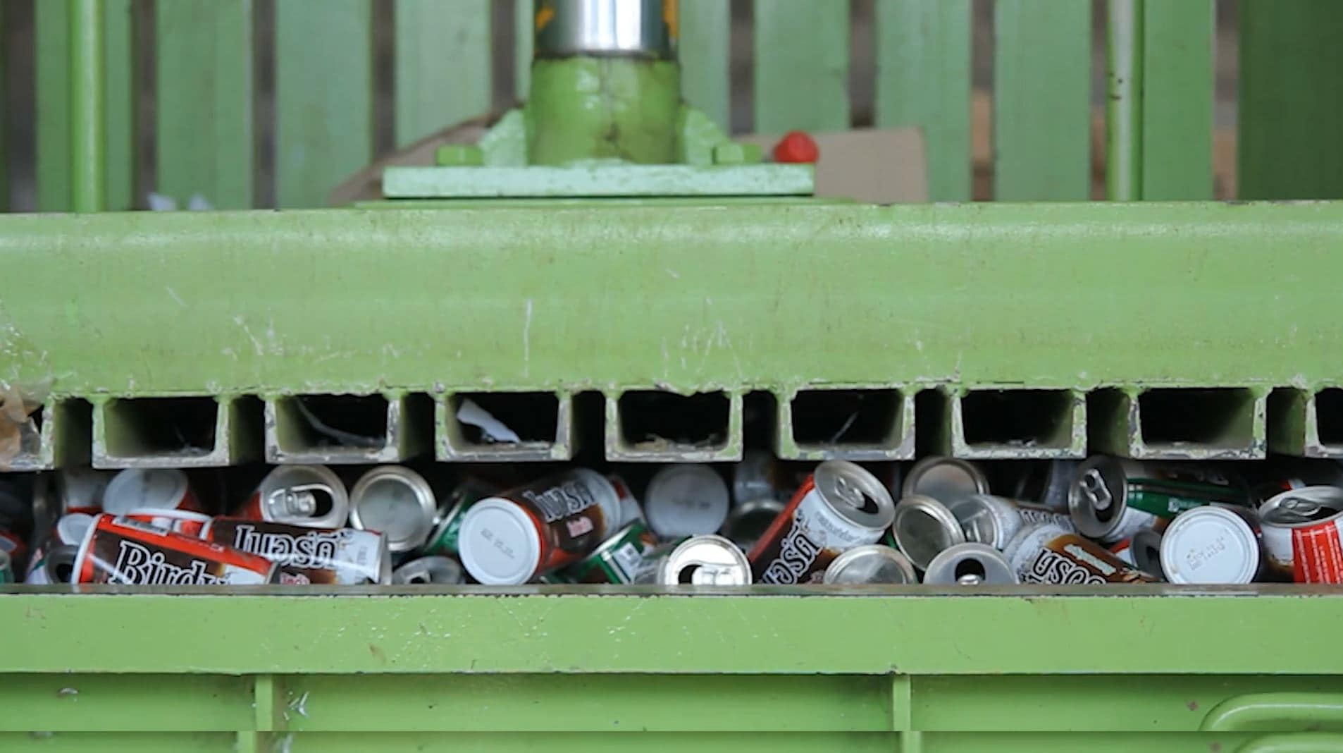 Machine squashing loads of cans