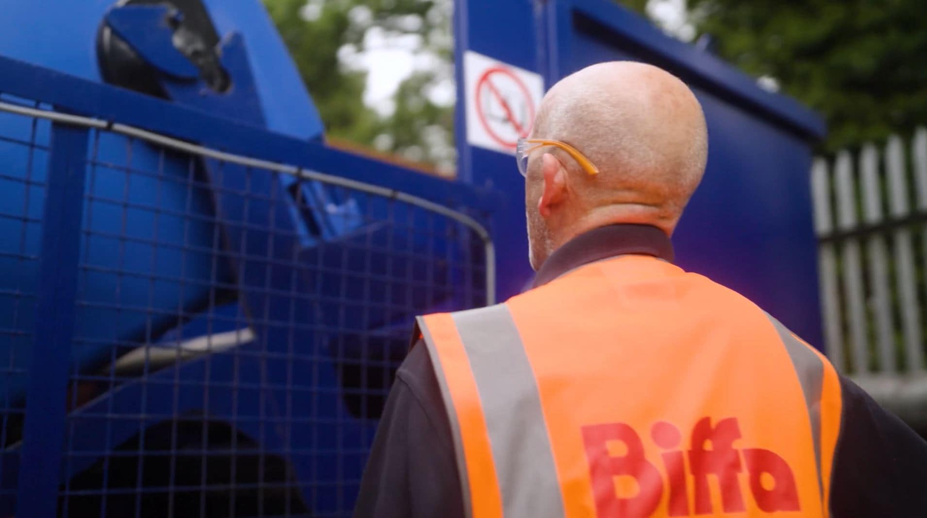 Biffa employee looking at equipment