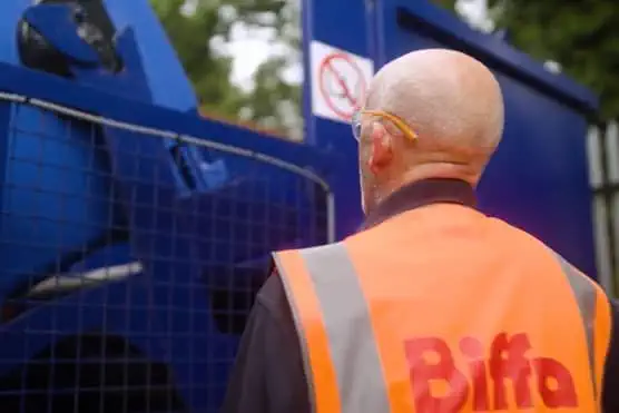 Biffa employee looking at equipment