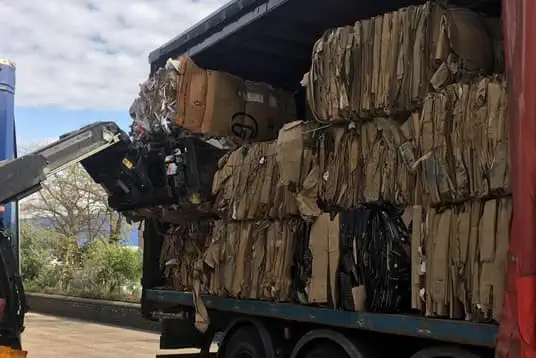 baled cardboard in truck