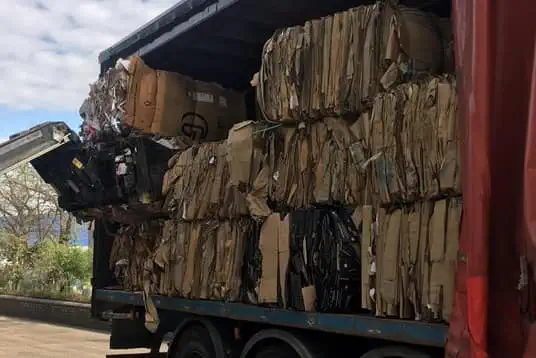 baled cardboard in truck