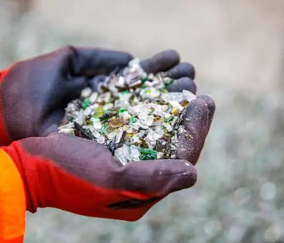 Man holding recycled glass