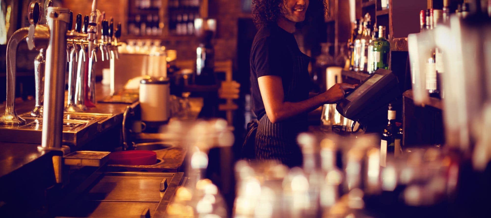 Employee behind the bar