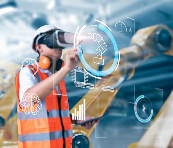 Man in high vis with VR headset and touch screen