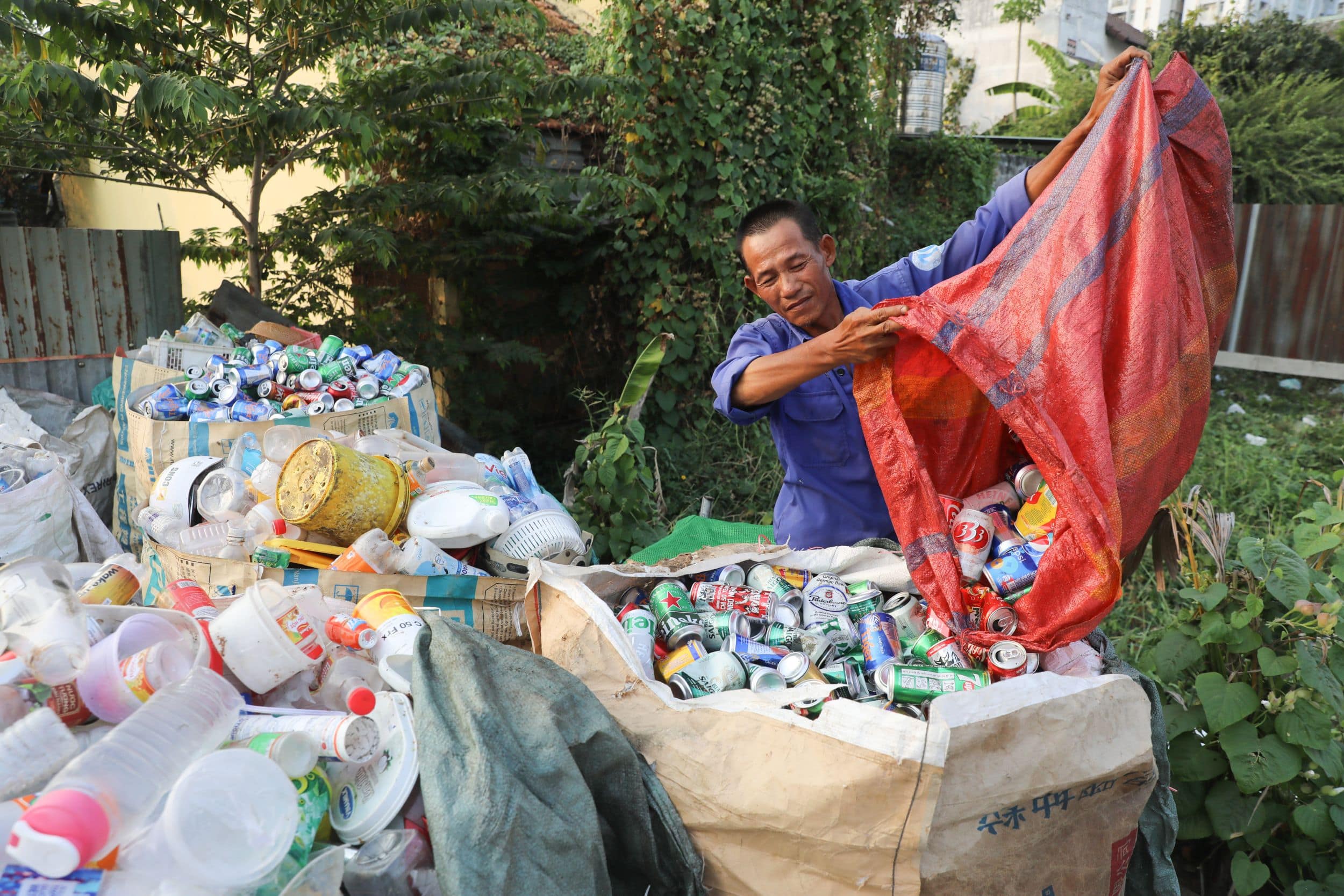 Man emptying cans