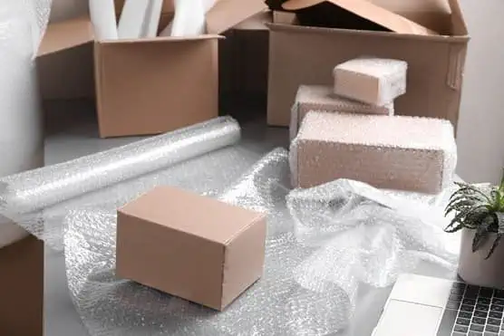 Boxes on table with bubble wrap