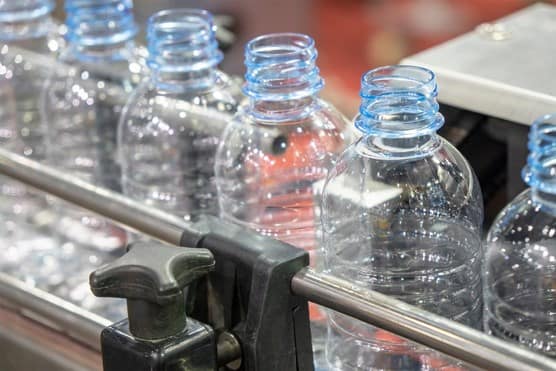 Plastic bottles on conveyor