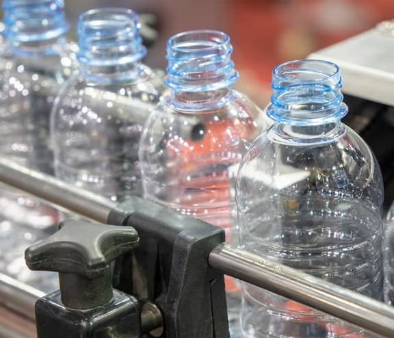 Plastic bottles on conveyor