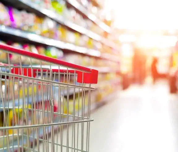 Trolley in supermarket isle