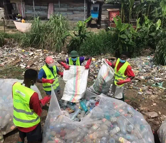WasteAid workers sorting waste